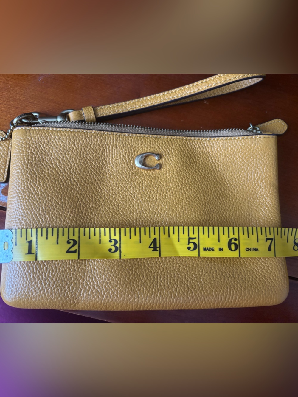Coach Mustard Yellow Pebbled Leather Wristlet Clutch